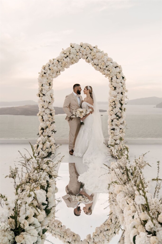 Featured in Issue 30, Jennifer and Zamir's modern & elegant elopement by the Sea in Santorini, Greece was everything they imagined and more.