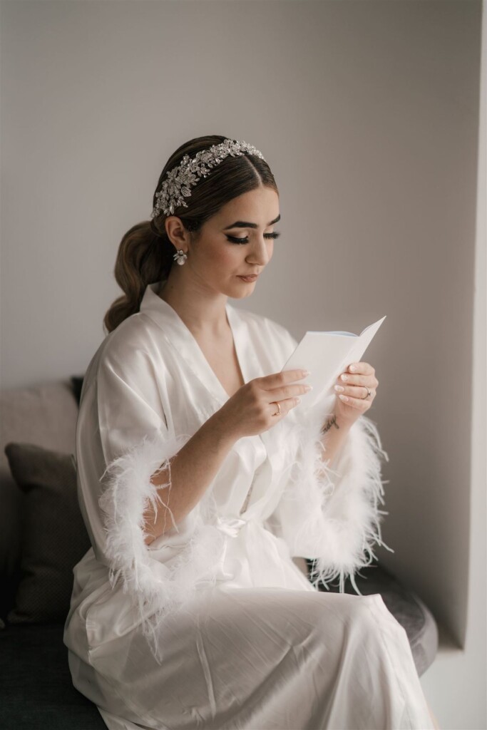 Featured in Issue 30, Jennifer and Zamir's modern & elegant elopement by the Sea in Santorini, Greece was everything they imagined and more.