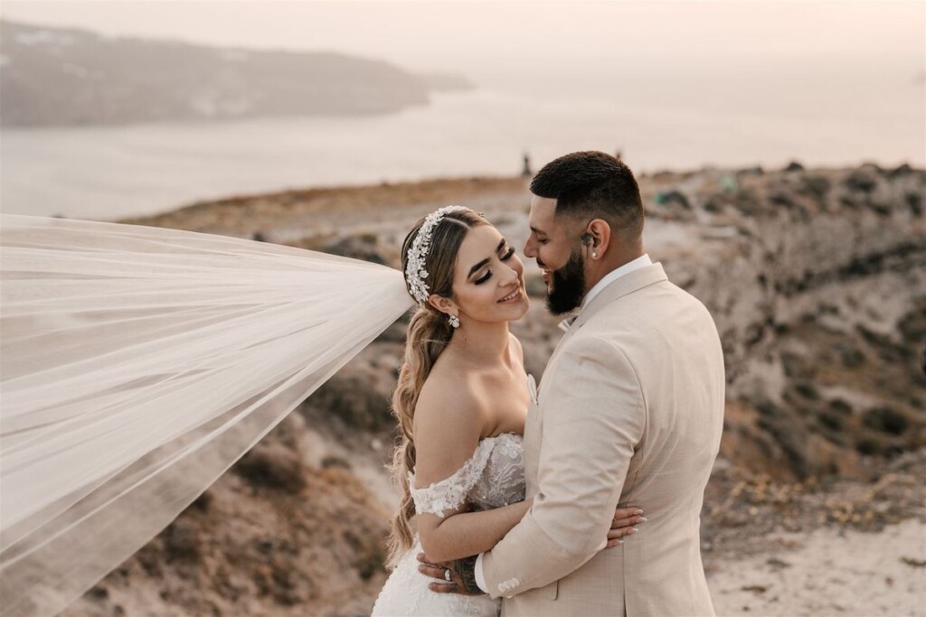 Featured in Issue 30, Jennifer and Zamir's modern & elegant elopement by the Sea in Santorini, Greece was everything they imagined and more.