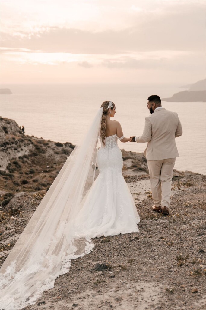 Featured in Issue 30, Jennifer and Zamir's modern & elegant elopement by the Sea in Santorini, Greece was everything they imagined and more.