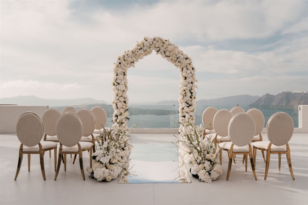 Featured in Issue 30, Jennifer and Zamir's modern & elegant elopement by the Sea in Santorini, Greece was everything they imagined and more.