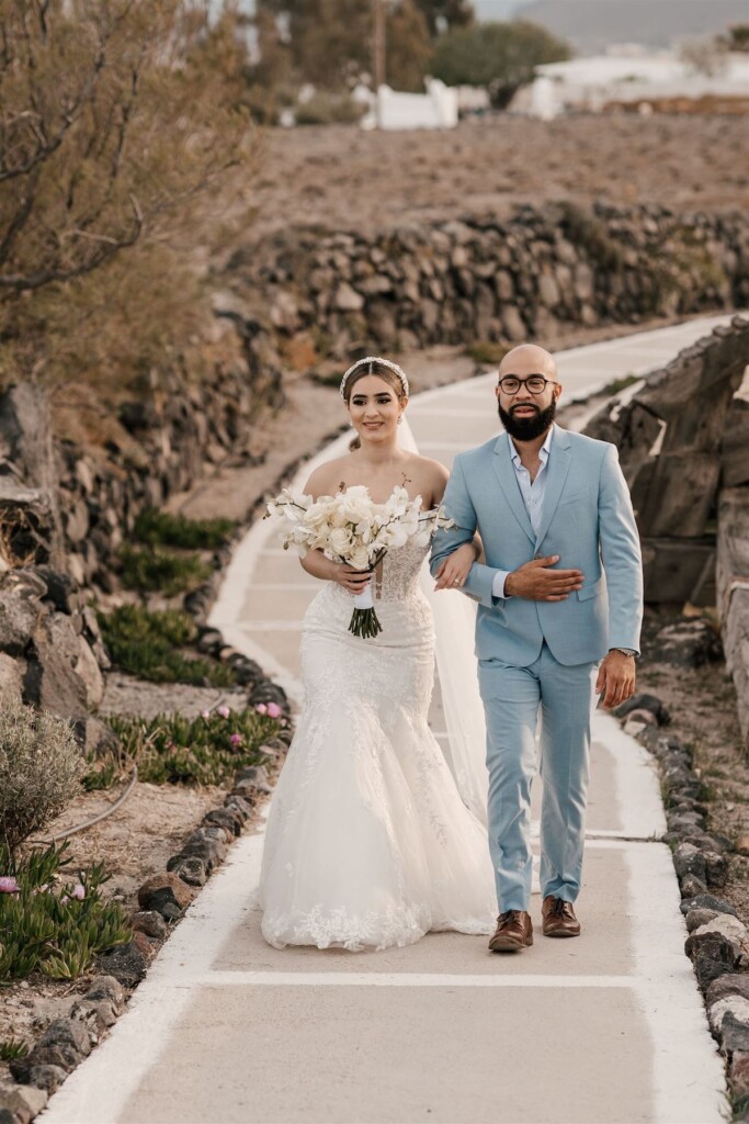 Featured in Issue 30, Jennifer and Zamir's modern & elegant elopement by the Sea in Santorini, Greece was everything they imagined and more.
