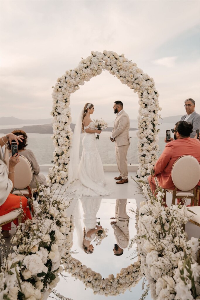 Featured in Issue 30, Jennifer and Zamir's modern & elegant elopement by the Sea in Santorini, Greece was everything they imagined and more.