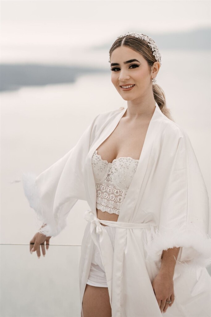 Featured in Issue 30, Jennifer and Zamir's modern & elegant elopement by the Sea in Santorini, Greece was everything they imagined and more.