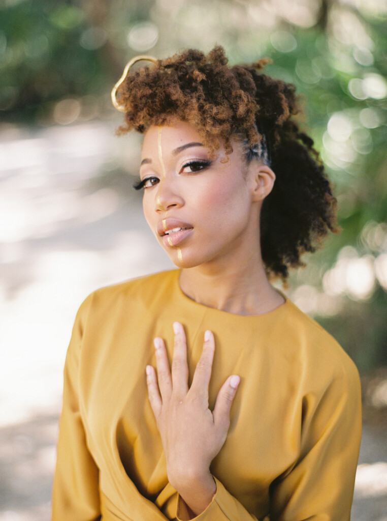 Featured in Issue 30, love transcends words in this elegant styled shoot on Amelia Island inspired by African Royalty.