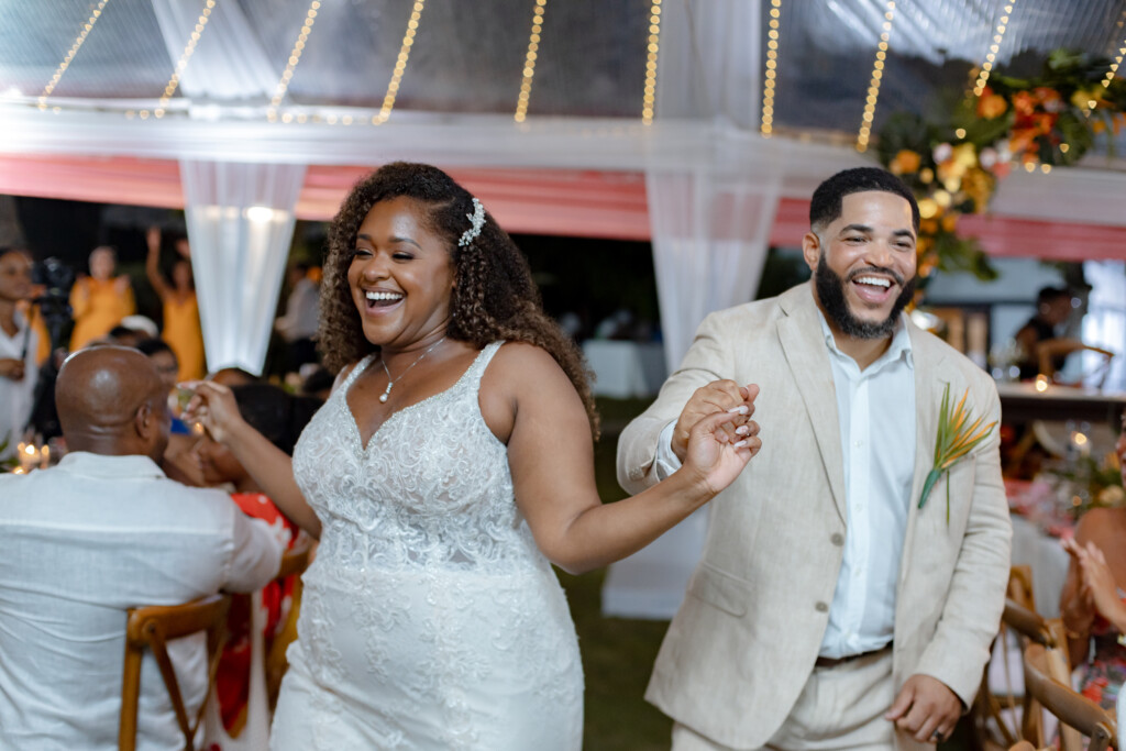 Abigail and Larry's love story began with a little help from their furbabies. Read their love story and see their Caribbean nuptials here!