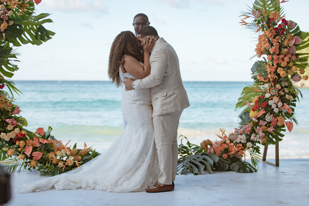 Abigail and Larry's love story began with a little help from their furbabies. Read their love story and see their Caribbean nuptials here!