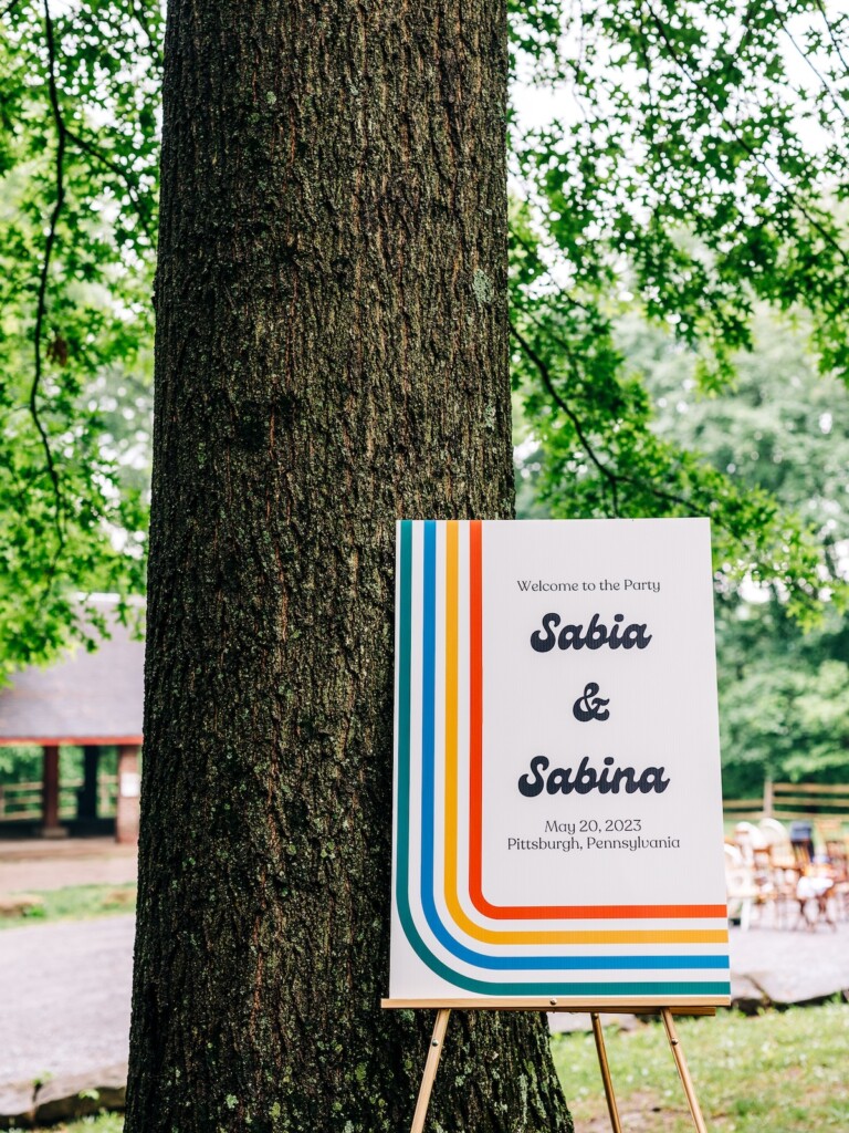 Sabina and Sabia celebrated their love as an LGBTQ+ couple in a colorful spring wedding with nostalgic retro charm throughout.