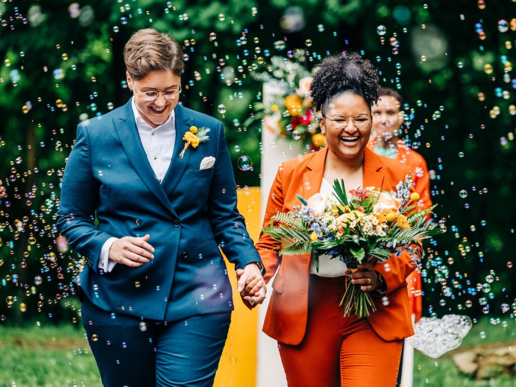 Sabina and Sabia celebrated their love as an LGBTQ+ couple in a colorful spring wedding with nostalgic retro charm throughout.