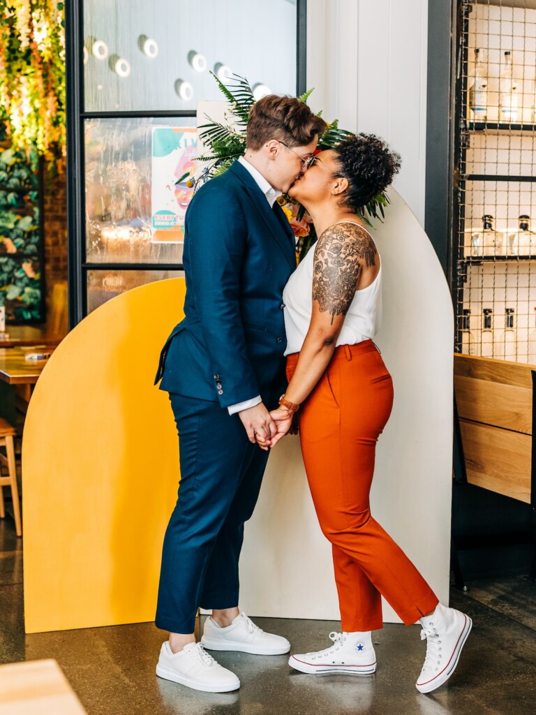 Sabina and Sabia celebrated their love as an LGBTQ+ couple in a colorful spring wedding with nostalgic retro charm throughout.