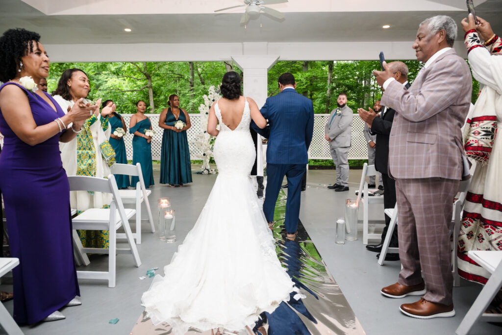 Family and friends gathered to watch Meron and Negash tie the knot in a ceremony filled with Ethiopian culture and modern ceremony details.