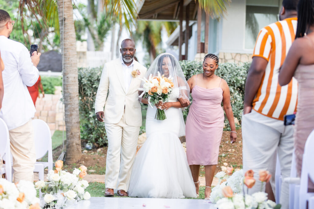 This travel-loving bride and groom exchanged their vows during a luxurious, romantic destination wedding in Jamaica overlooking Montego Bay.