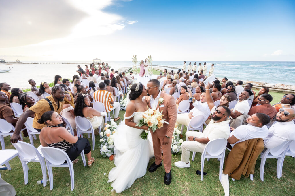 This travel-loving bride and groom exchanged their vows during a luxurious, romantic destination wedding in Jamaica overlooking Montego Bay.