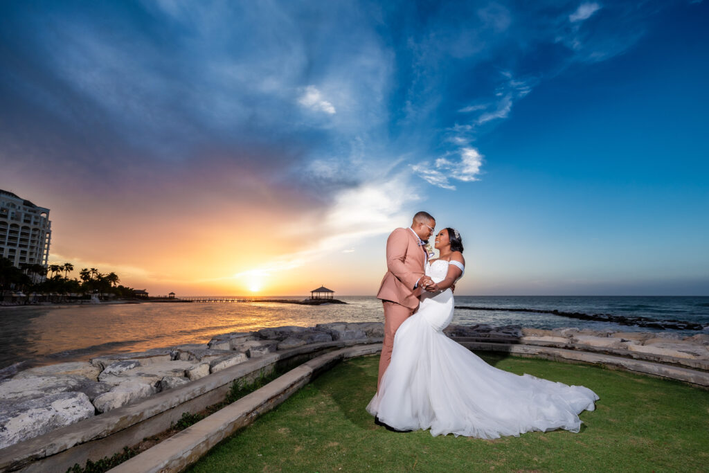 This travel-loving bride and groom exchanged their vows during a luxurious, romantic destination wedding in Jamaica overlooking Montego Bay.