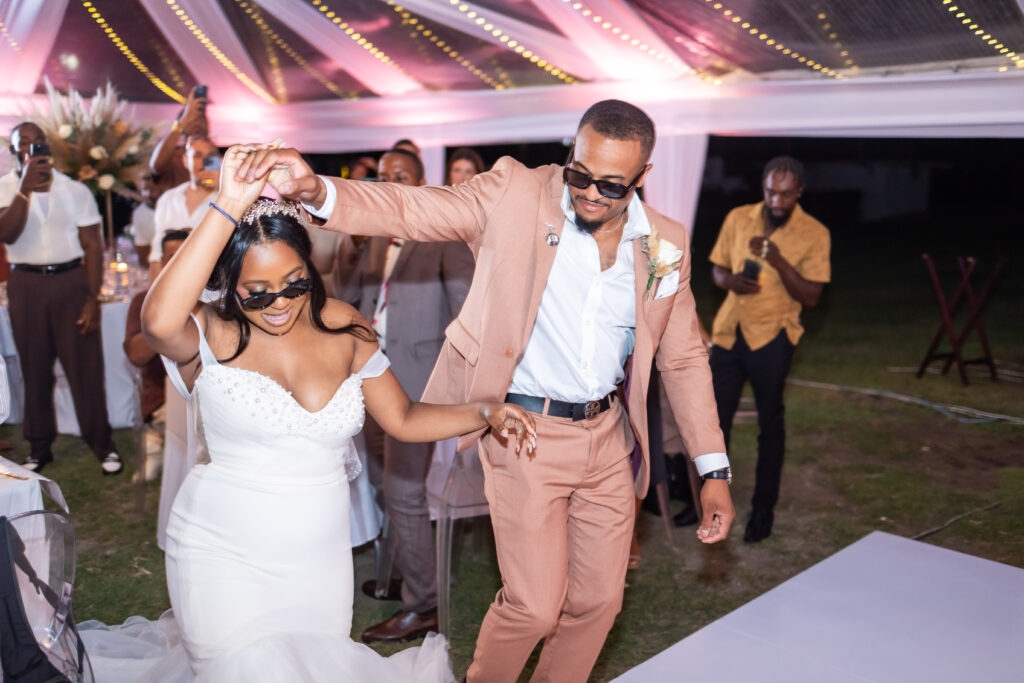 This travel-loving bride and groom exchanged their vows during a luxurious, romantic destination wedding in Jamaica overlooking Montego Bay.