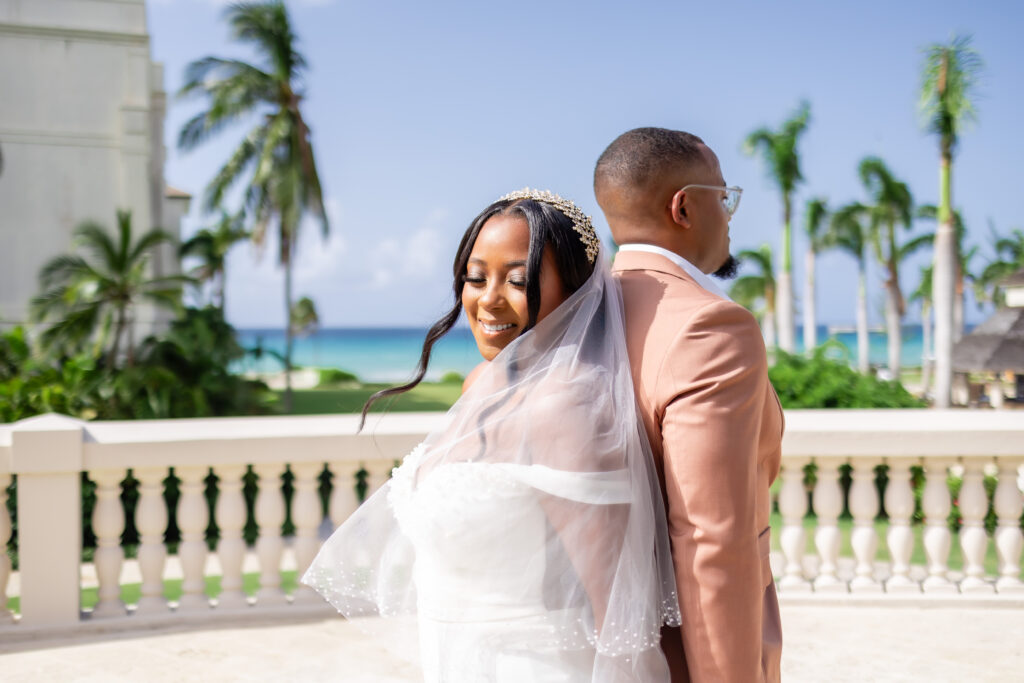 This travel-loving bride and groom exchanged their vows during a luxurious, romantic destination wedding in Jamaica overlooking Montego Bay.