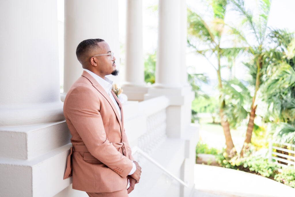 This travel-loving bride and groom exchanged their vows during a luxurious, romantic destination wedding in Jamaica overlooking Montego Bay.