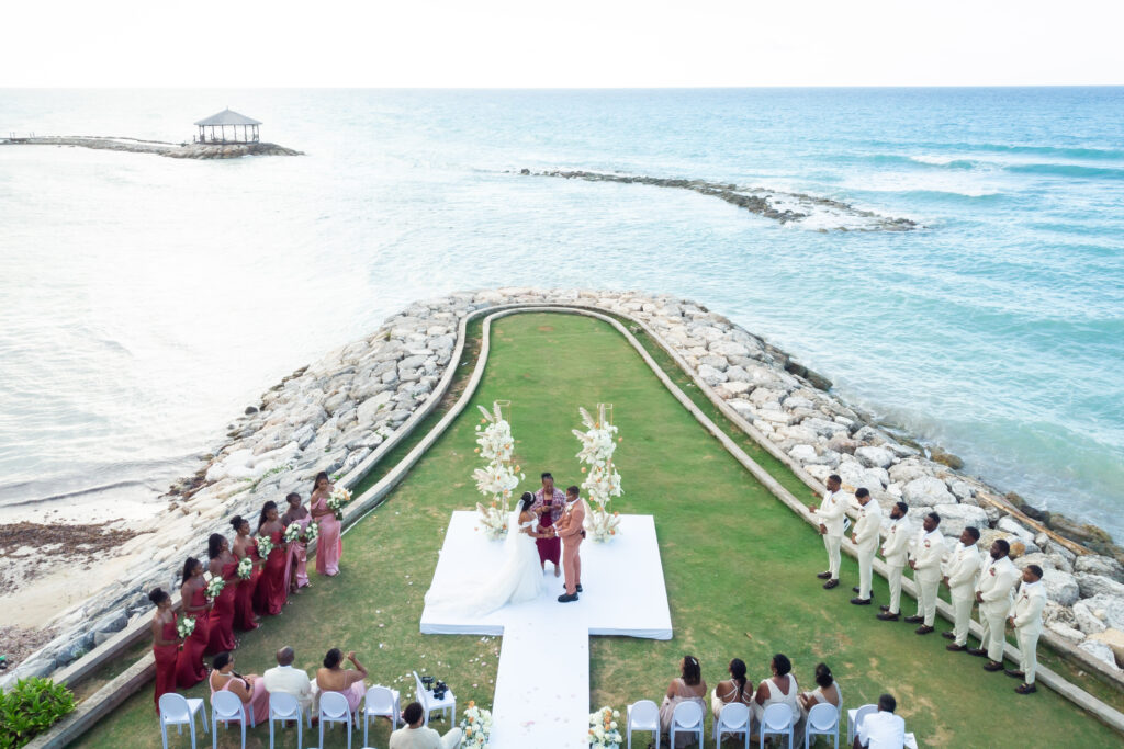 This travel-loving bride and groom exchanged their vows during a luxurious, romantic destination wedding in Jamaica overlooking Montego Bay.