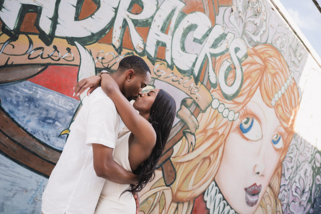 What goes best with ice cream? A cool couple celebrating their engagement with a chic and laid-back beach engagement session in Florida.