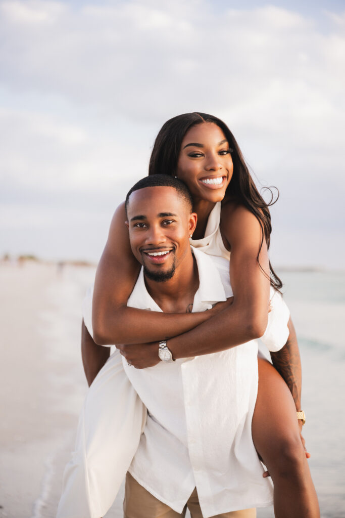 What goes best with ice cream? A cool couple celebrating their engagement with a chic and laid-back beach engagement session in Florida.