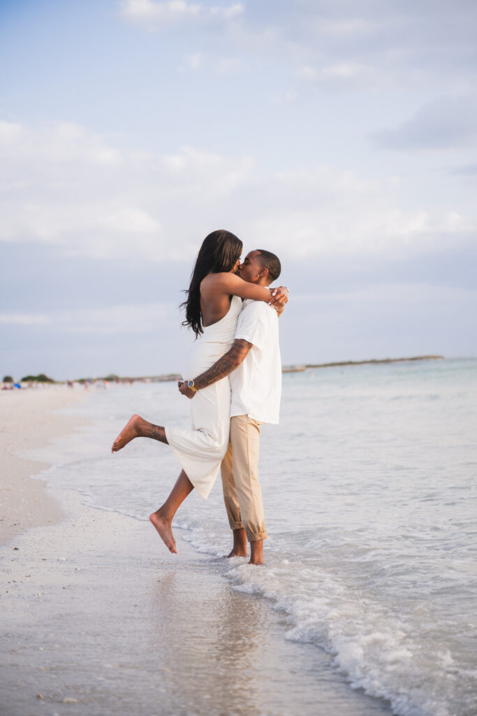What goes best with ice cream? A cool couple celebrating their engagement with a chic and laid-back beach engagement session in Florida.