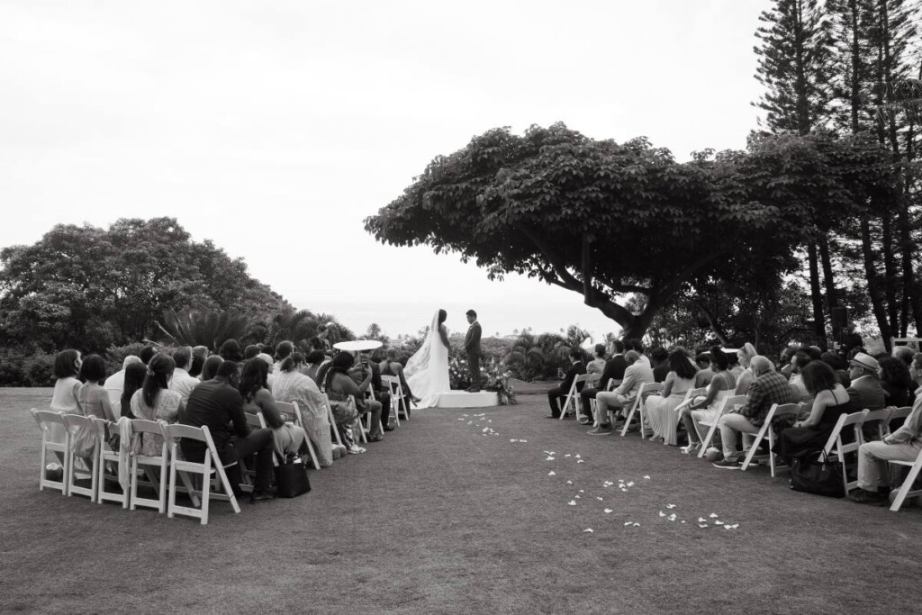 Oahu's soaring mountains and lush flora provided a breathtaking backdrop for Nicole and Ryo's chic garden wedding in Hawaii.