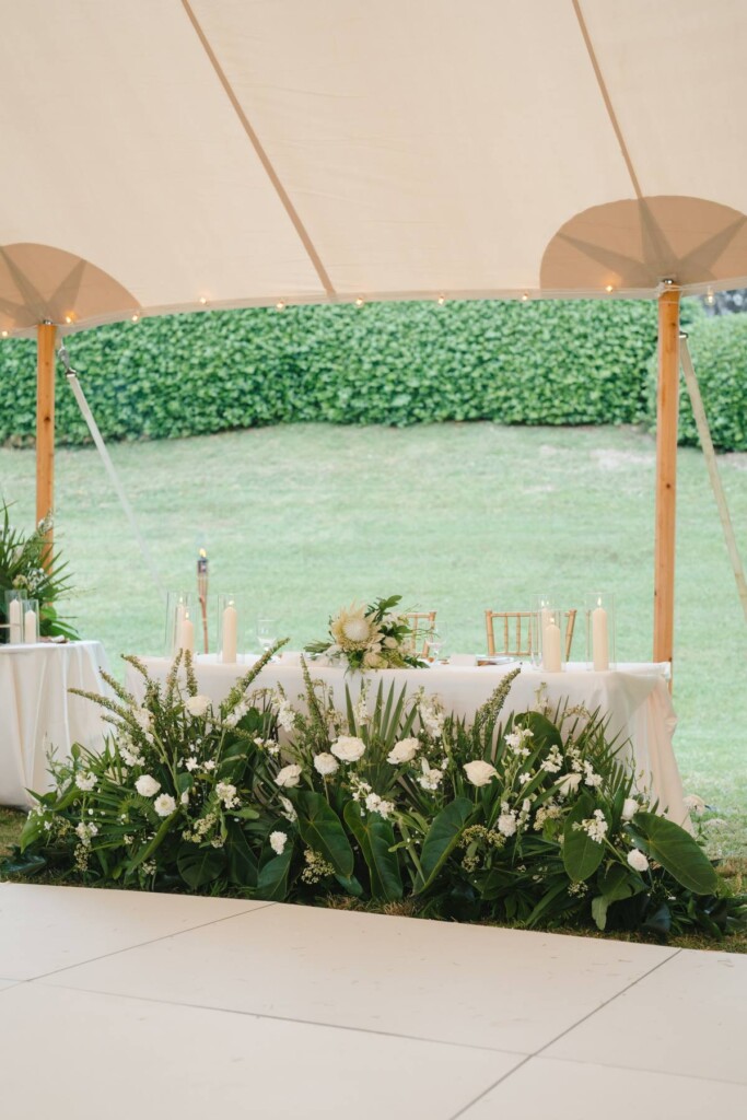 Oahu's soaring mountains and lush flora provided a breathtaking backdrop for Nicole and Ryo's chic garden wedding in Hawaii.