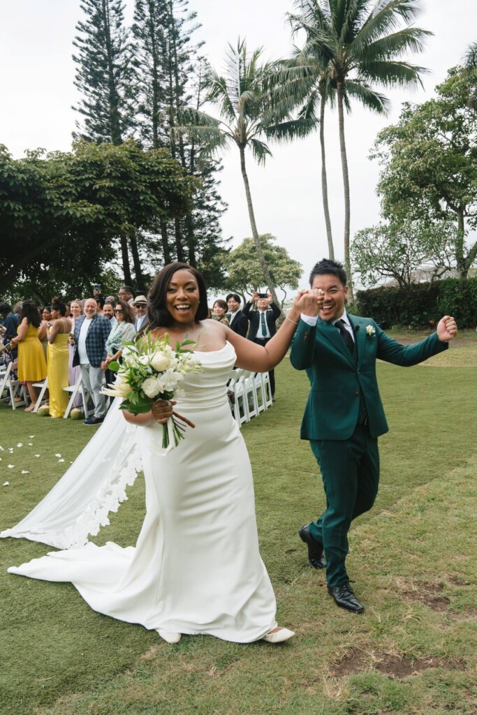Oahu's soaring mountains and lush flora provided a breathtaking backdrop for Nicole and Ryo's chic garden wedding in Hawaii.