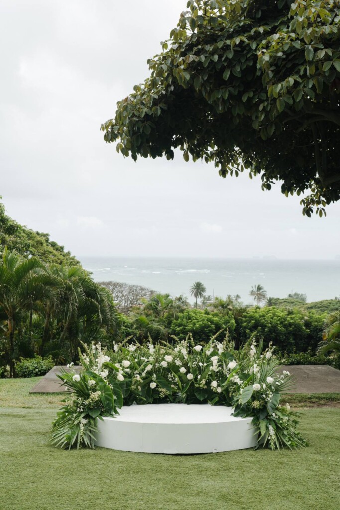 Oahu's soaring mountains and lush flora provided a breathtaking backdrop for Nicole and Ryo's chic garden wedding in Hawaii.