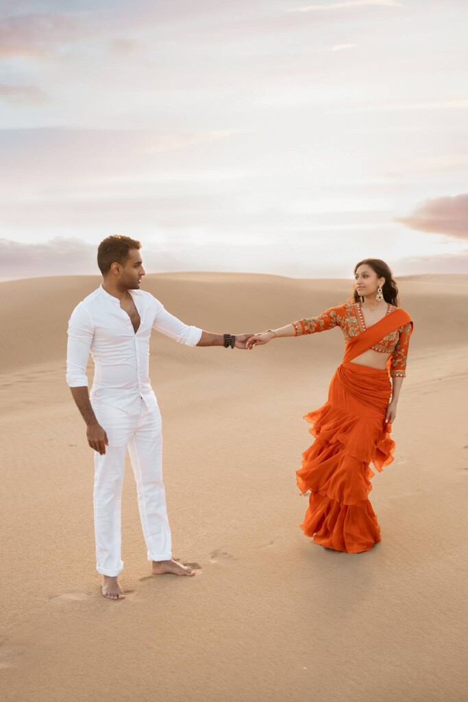 Nithin and Papiya celebrated their love with a dreamy Bollywood-inspired engagement session at the Oceano Dunes in California.