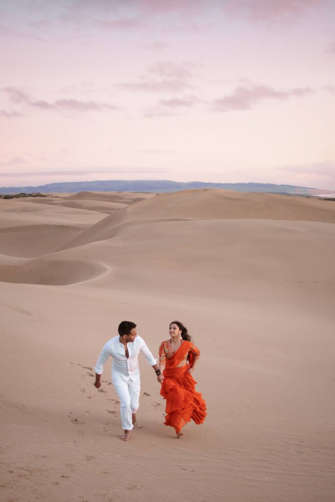 Nithin and Papiya celebrated their love with a dreamy Bollywood-inspired engagement session at the Oceano Dunes in California.