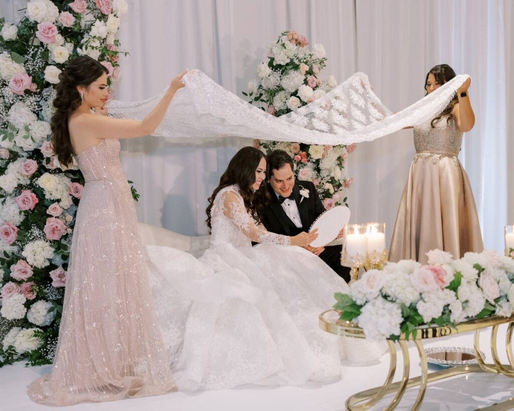 Combining the bride's Afghan heritage with the groom's Egyptian background, Saha and Gamal tied the knot in a timeless multicultural wedding celebration at the Ritz-Carlton in Washington DC, the city where they first met. 