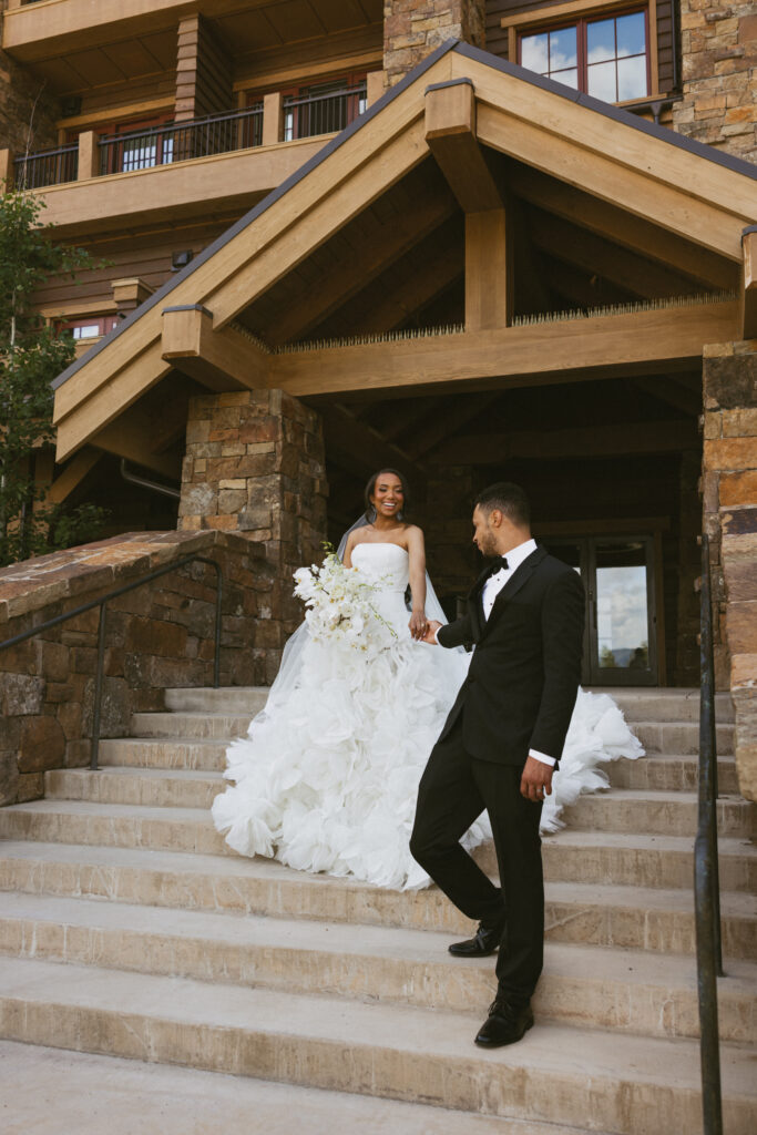 Mountains, 3 wedding dresses, and a fun bowling alley after party. This outdoor wedding had everything for a nature-loving bride and groom.