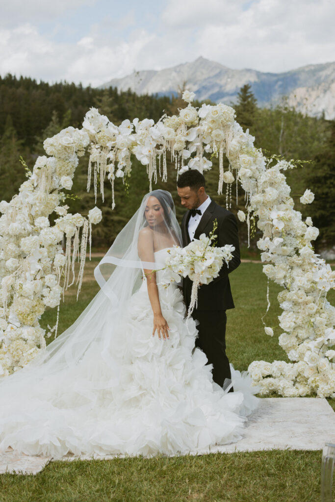 Mountains, 3 wedding dresses, and a fun bowling alley after party. This outdoor wedding had everything for a nature-loving bride and groom.