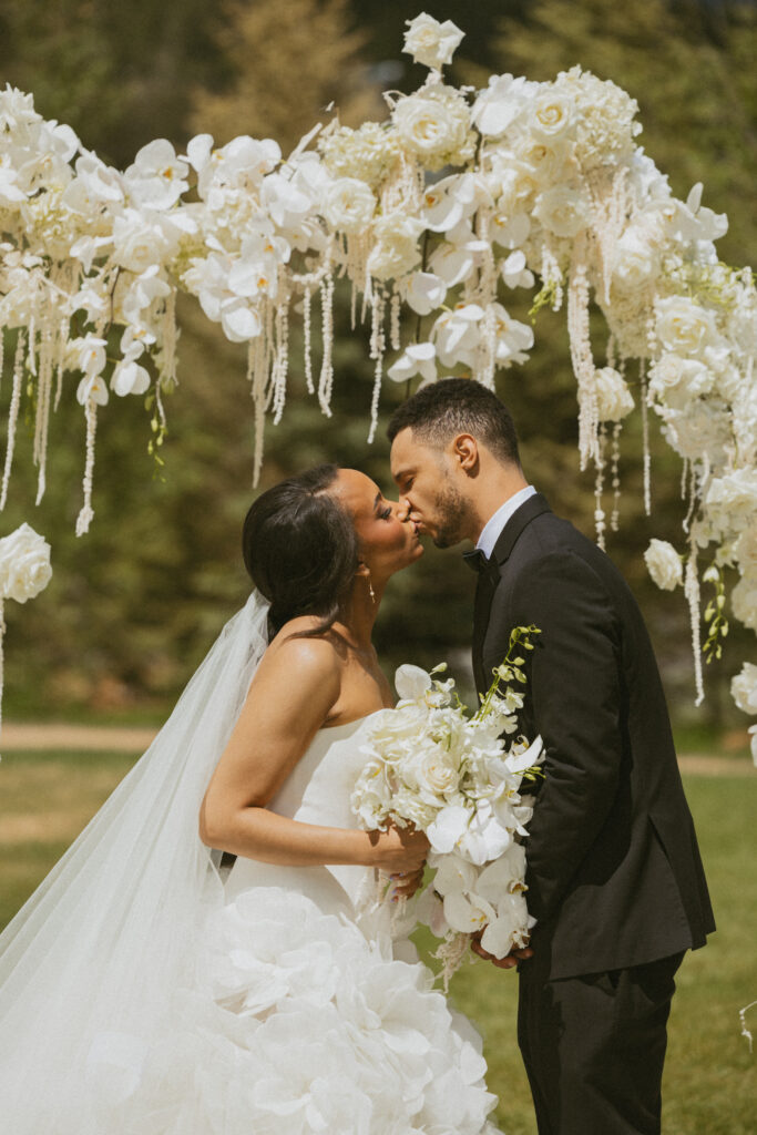 Mountains, 3 wedding dresses, and a fun bowling alley after party. This outdoor wedding had everything for a nature-loving bride and groom.
