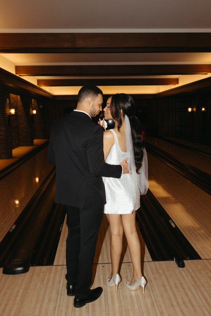 Mountains, 3 wedding dresses, and a fun bowling alley after party. This outdoor wedding had everything for a nature-loving bride and groom.
