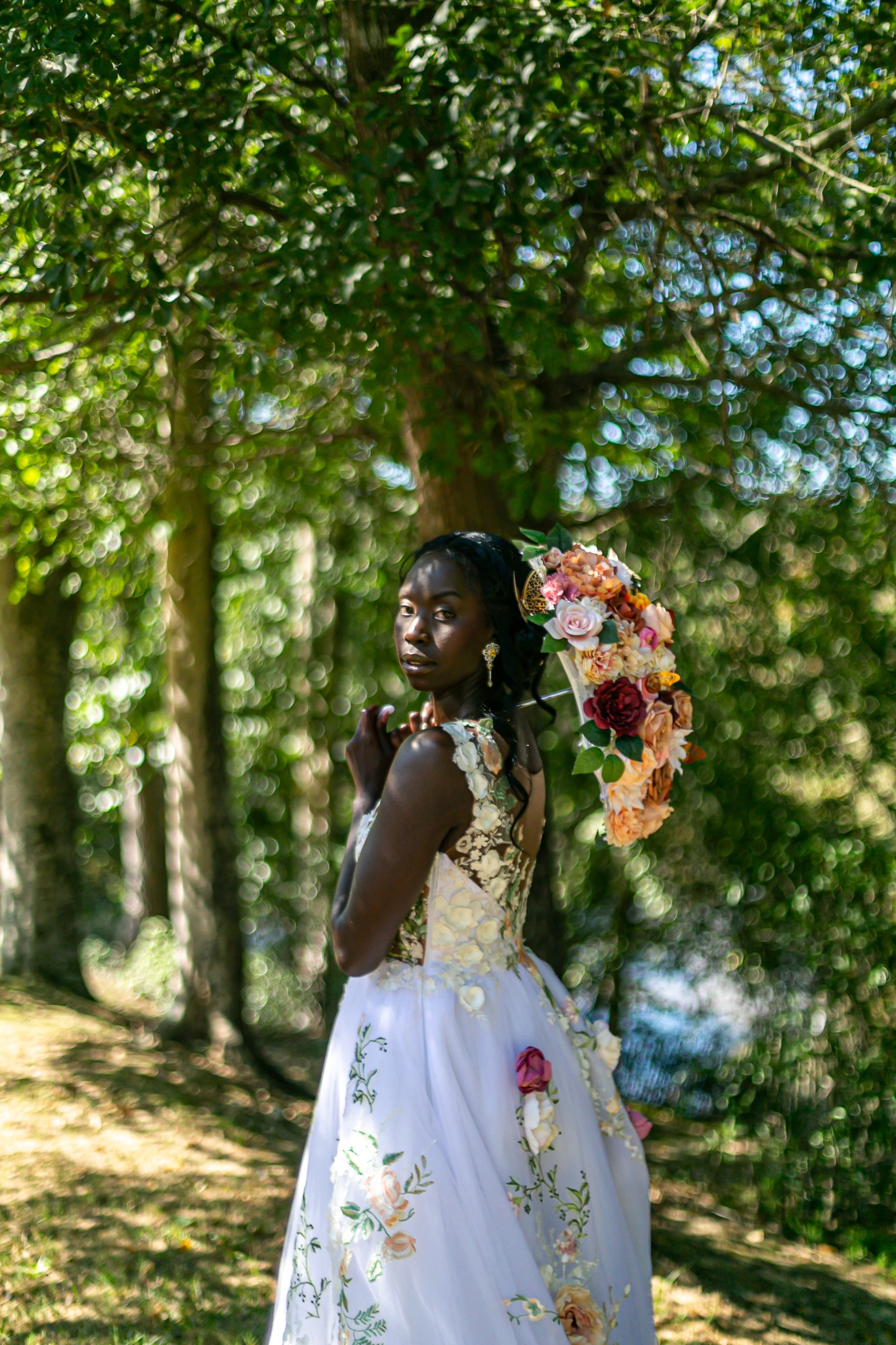 Muna Coterie gown designer and boutique owner Whitney Stephenson of Mahogany Brown Bridal invites you into a world of bridal elegance inspired by the regal grandeur of the Bridgerton era. 
