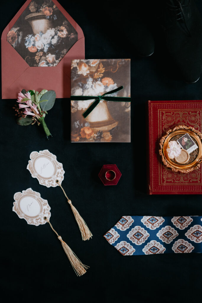 Victorian aesthetics, romantic decor, and deep-hued florals filled this luxurious wedding-styled shoot at Manoir Blackswan in Quebec.