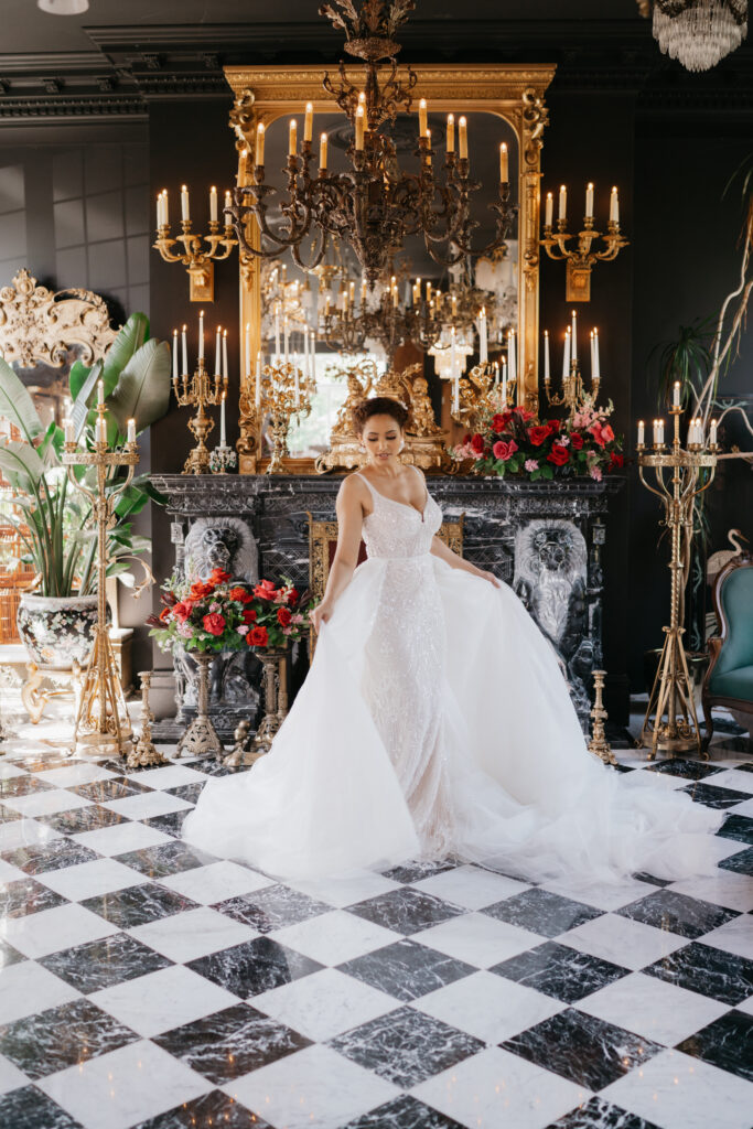 Victorian aesthetics, romantic decor, and deep-hued florals filled this luxurious wedding-styled shoot at Manoir Blackswan in Quebec.