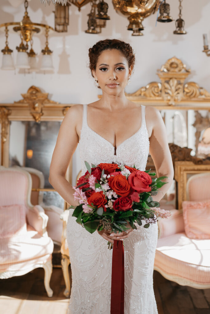 Victorian aesthetics, romantic decor, and deep-hued florals filled this luxurious wedding-styled shoot at Manoir Blackswan in Quebec.