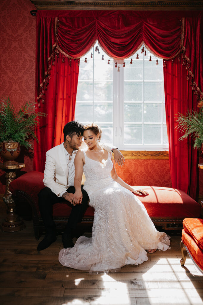 Victorian aesthetics, romantic decor, and deep-hued florals filled this luxurious wedding-styled shoot at Manoir Blackswan in Quebec.