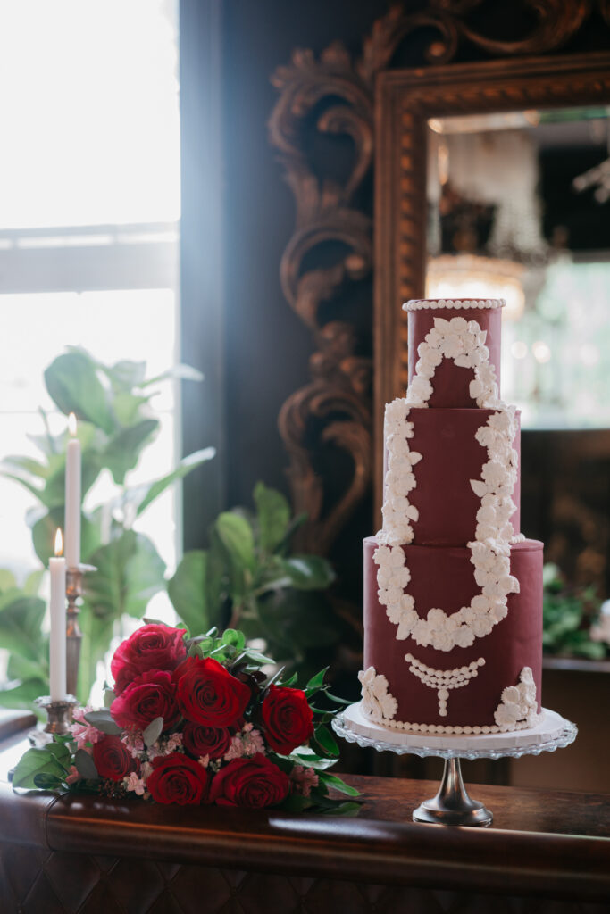 Victorian aesthetics, romantic decor, and deep-hued florals filled this luxurious wedding-styled shoot at Manoir Blackswan in Quebec.