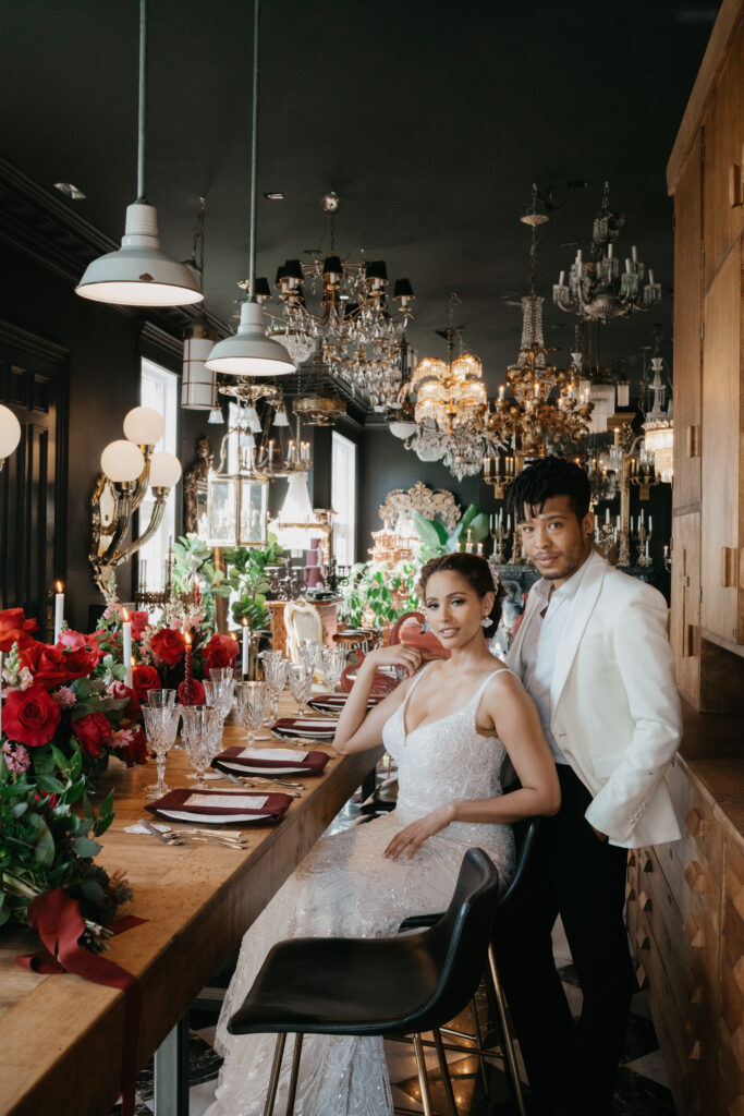 Victorian aesthetics, romantic decor, and deep-hued florals filled this luxurious wedding-styled shoot at Manoir Blackswan in Quebec.
