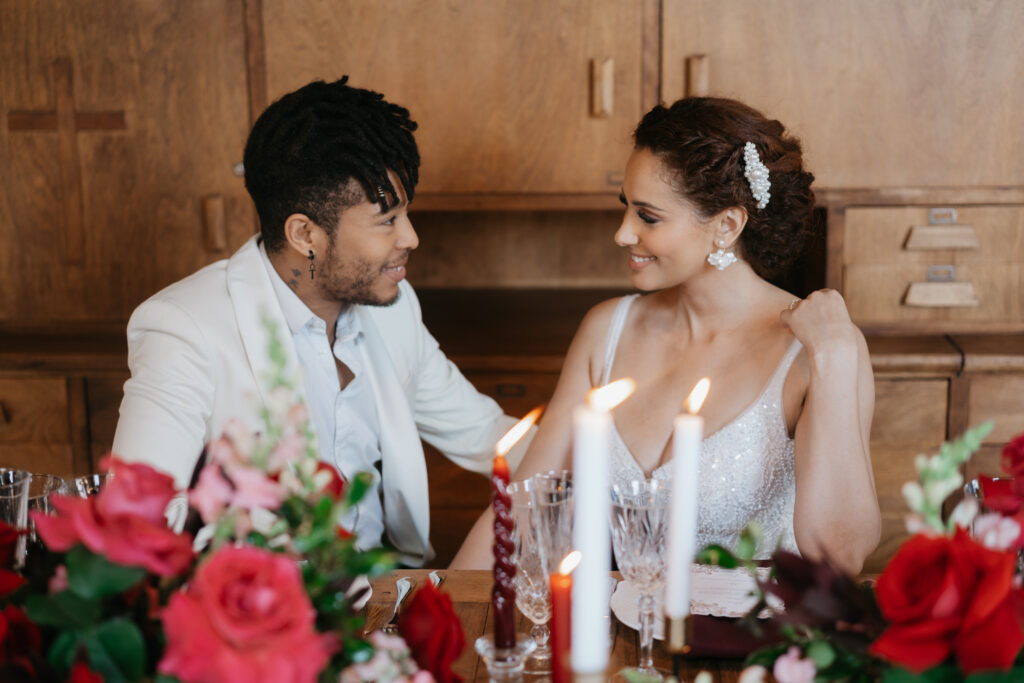 Victorian aesthetics, romantic decor, and deep-hued florals filled this luxurious wedding-styled shoot at Manoir Blackswan in Quebec.