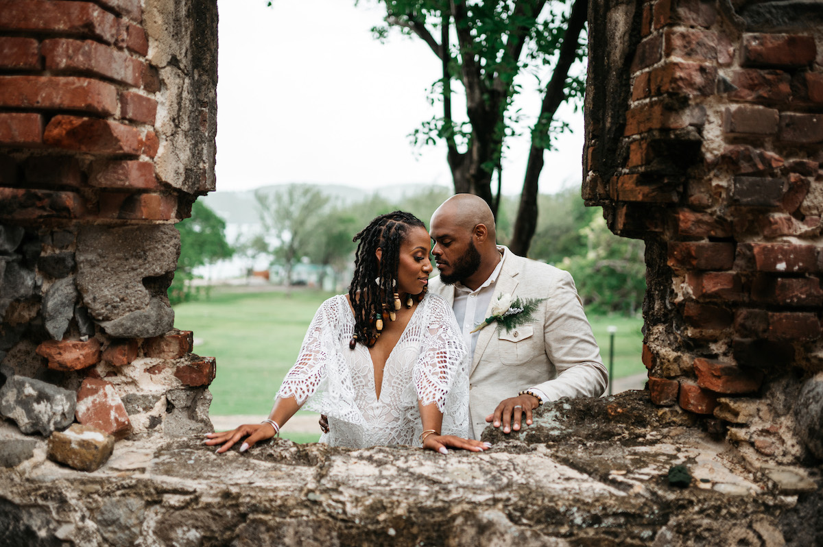 Celebrating a Decade of Love: Rustic Bohemian Vow Renewal Surrounded by Captivating Ruins on Pigeon Island in St. Lucia