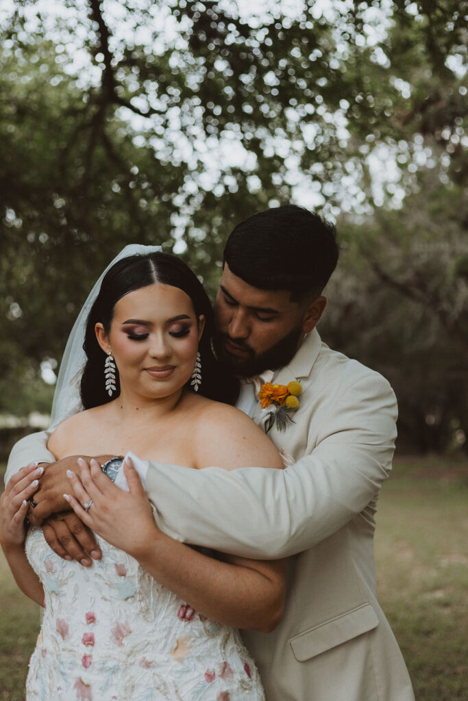 This charming rustic outdoor wedding was filled with vibrant summer florals and an unforgettable Morilee gown.