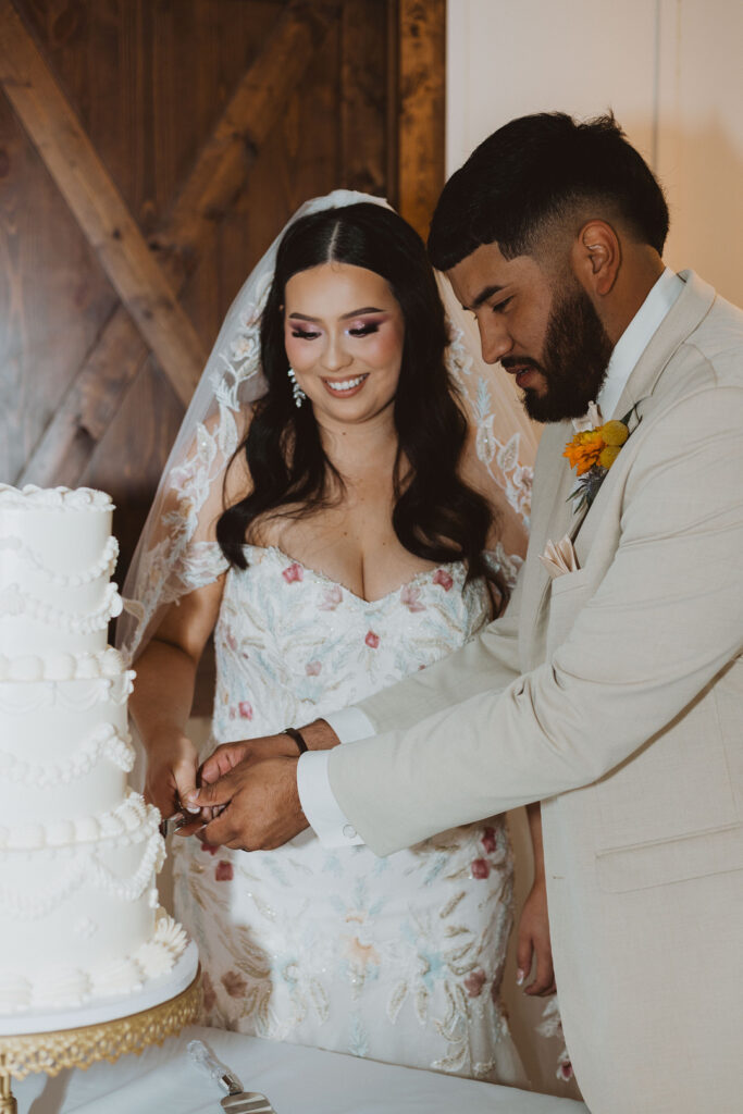 This charming rustic outdoor wedding was filled with vibrant summer florals and an unforgettable Morilee gown.