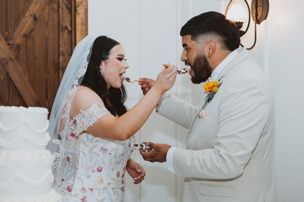 This charming rustic outdoor wedding was filled with vibrant summer florals and an unforgettable Morilee gown.